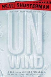 Unwind by Neal Shusterman book cover. The word unwind appears to be shrink-wrapped. 