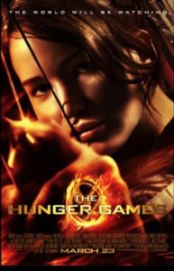 Jennifer Lawrence as Katniss Everdeen in the film poster for The Hunger Games. She is shooting an arrow straight ahead of her at whoever is looking at the poster. 