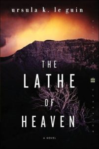 The Lathe of Heaven by Ursula K. Le Guin book cover. Photo shows a mountain and some scrub brush. 