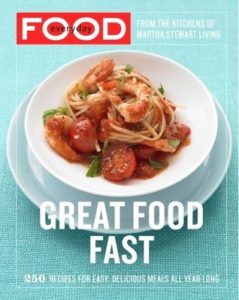 Everyday Food- Great Food Fast by Martha Stewart. Image on cover is of spaghetti with tomato sauce, cooked tomatoes, and shrimp. 