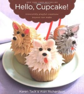 Hello Cupcake by Alan Richards and Karen Tack. Image on cover is of cupcakes whose frosting has been piped on to make them look like miniature poodles. 