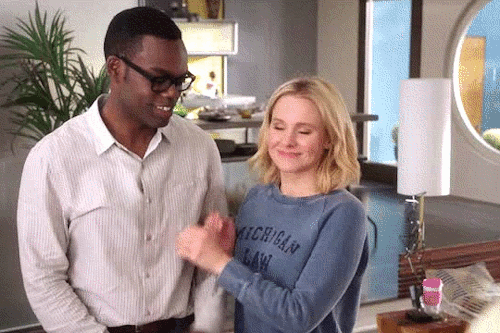 Chidi and Eleanor from The Good Place hugging each other