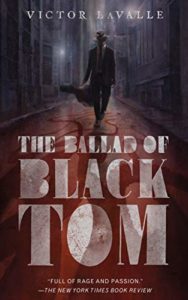 The Ballad of Black Tom by Victor LaValle book cover. Image on cover is of a man wearing a top hat and black cloak walking down a dark alley. 
