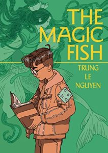 The Magic Fish by Trung Le Nguyen book cover. Image on cover is of boy reading a book and of mermaids swimming in the background.