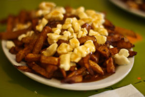 A plate filled with poutine 