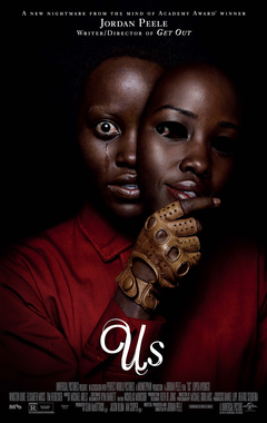 Film poster for Us. Image on poster is a photograph of one of the main characters holding a mask that is identical to their face. Their real face is crying. 