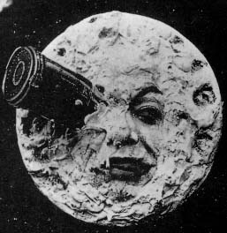 Screenshot from Le Voyage dans la lune (A Trip to the Moon) (1902) in which a rocket ship has wedged itself into the eye of the moon.
