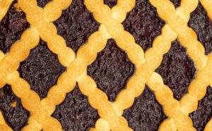 close-up photo of a fruit pie with a lattice crust