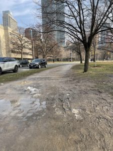 A muddy running trail at a park in December. 