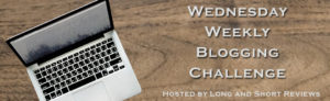 Graphic for the Wednesday Blogging Challenge. Image in graphic shows a laptop sitting on a wooden surface. 