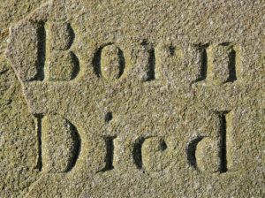 Tombstone that reads "born" and "died"