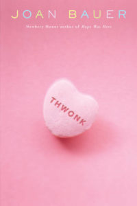 Thwonk by Joan Bauer book cover. Image on cover shows pink coversation heart with the word thwonk written on it.