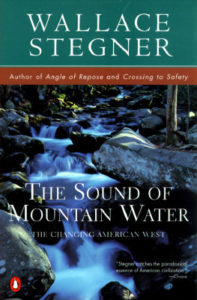 The Sound of Mountain Water by Wallace Stegner book cover. Image on cover is of a mountain stream filled with water rushing over the many rocks in it.