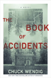 The Book of Accidents  by Chuck Wendig book cover. Image on cover is a black-and-white-photograph of a ghost standing in front of an old and possibly abandoned house in the woods.