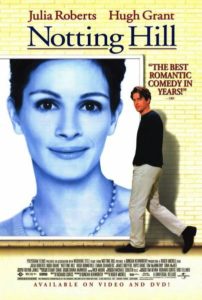 Notting Hill fim poster. It shows a large photo of Julia Roberts with Hugh Grant walking next to it. 