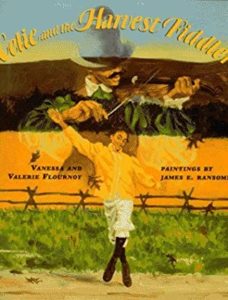 Celie and the Harvest Fiddler by Valerie Flournoy Book cover. Image on cover is a drawing of a girl dancing in a field near a fence. A drawing of a man playing the fiddle is superimposed on top of her. 