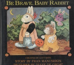Be Brave, Baby Rabbit by Lucy Bate book cover. Image on cover shows a drawing of two rabbits wearing costumes and going trick or treating. 
