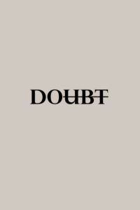 The word doubt printed on a grey background. The “ubt” has been crossed out, leaving only the word “do.” 