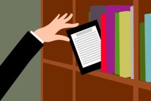 Cartoon image of person pulling an ereader out from a shelf filled with paper books 
