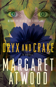 and Crake (MaddAddam, #1) by Margaret Atwood book cover. Image on cover shows flowers and leaves superimposed over the head of a young woman who looks a little frightened.