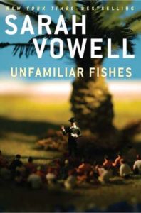 nfamiliar Fishes by Sarah Vowell book cover. Image on cover shows painting of Hawaiians sitting underneath tree as white man stands looking down upon them. 