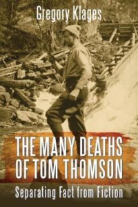 The Many Deaths of Tom Thomson: Separating Fact from Fiction by Gregory Klages Book cover. Image on cover shows a photo of Tom Thompson standing on a log while wearing a knit cap and some working clothes. 