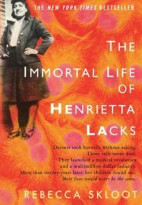The Immortal Life of Henrietta Lacks by Rebecca Skloot book cover. Image on cover shows a photo of Henrietta Lacks before she was diagnosed with incurable cancer. She is smiling and has a hand on one hip. 