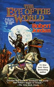 The Eye of the World (The Wheel of Time, #1) by Robert Jordan book cover. image on cover is a drawing of knights riding horses under a full moon.