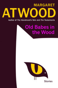 Old Babes in the Woods: Stories by Margaret Atwood Book cover. Image on cover shows a drawing of a white cat with yellow and black eyes staring straight ahead at the reader. 