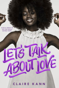 Book cover for Let's Talk About Love by Claire Kann. The image on the cover shows a radiant dark-skinned black woman with an Afro. She’s wearing a sleeveless white blouse with ruffles near her neck and his holding both arms up in a triumphant pose as she grins and closes her eyes. 