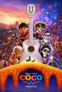 Film poster for the Pixar film Coco. It shows a drawing of a large white guitar surrounded by several of the main characters of the film, including Miguel, his abuela, and three skeletons who are ancestors of Miguel’s family. They are standing in front of the Land of the Dead, and there is a small image of Miguel walking with his dog at the bottom of the image. 