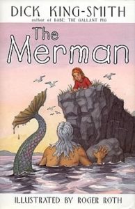 Book cover for The Merman by Dick King-Smith. Image on cover shows a merman with olive skin and white hair swimming in the ocean with his tail flipped out of the weather. He’s looking at a girl who is wearing a red dress. She is sitting on top of a large rock and looking down at him as seagulls fly by. 