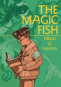 Book cover for The Magic Fish by Trung Le Nguyen. Image on cover shows a Vietnamese kid with short hair and glasses who is wearing a patched jacket and reading a book. There is a faint drawing of a mermaid swimming on the green background behind him. 