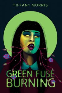 Book cover for Green Fuse Burning by Tiffany Morris. Image on cover shows a black-haired woman with glowing eyes leaning her head back slightly and opening her mouth as red string (or maybe blood vessels?) wind their way out of her mouth, possibly in search of their next victim. The woman’s head is surrounded by a sickly green halo that is reminiscent of the white or yellow halos painted around the heads of saints in Medieval paintings. 