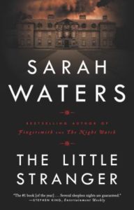 Book cover for The Little Stranger by Sarah Waters. Image on cover shows a shadowy photo of a grand old house that is now decaying into ruin because the owners can no longer afford to maintain or repair it. 