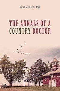 Book cover for The Annals of a Country Doctor by Carl Matlock, MD. Image on cover shows a drawing of a red house. There are a few large trees growing next to it and a flock of geese flying in the sky above in a v formation. 
