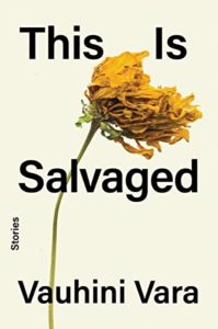 Book cover for This Is Salvaged by Vauhini Vara. Image on cover shows a dried yellow flower - possibly a rose? - that is lying against a light yellow background. Most of the flower has been fairly well preserved, but a few petals are loose and just about to fall off. 