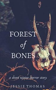 Book cover for Forest of Bones: A Short Winter Horror Story by Jessie Thomas. Image on cover is a close-up photo of someone wearing a black dress and holding the skull of an animal that has two long, mostly straight antlers protruding from its head. 