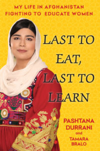 Book cover for Last to Eat, Last to Learn: My Life in Afghanistan Fighting to Educate Women  by Pashtana Durrani Image on cover is a photograph of the author wearing a white headscarf and a gorgeous red and yellow dress that flows around her body loosely and modestly. She is smiling slightly in this photo. 