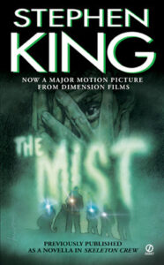 Book cover for The Mist by Stephen King. Image on cover shows the title spelled out in a thick white mist above a drawing of four people wearing protective gear walking through thick fog as they shine their lights to dimly illuminate the path before them. Above them there is a superimposed image of a white man covering his face with his hands and peeking out between his fingers in fear. 