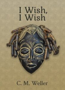 Book cover for I Wish, I Wish by C M Weller. Image on cover shows a wooden African mask whose dreadlocked-hair is actually made of spent bullet casings. It’s a cool and unsettling piece of art! 