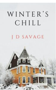 Book cover for Winter’s Chill by J D Savage. Image on cover shows a yellow late 1800s or early 1900s style house with a large porch on the right and a turret on the left. The house is covered in snow as it is the dead of winter.