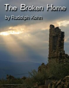 Book cover for The Broken Home by Rudolph Kohn. Image on cover shows part of a stone building with a window in it. Most of the rest of the building has been destroyed. These ruins are set against a cloudy desert background. A few rays of light are poking through and illuminating the scene and the few plants growing in the soil beneath it. 