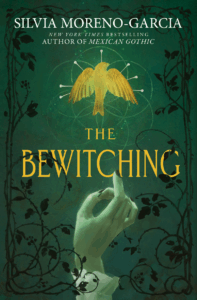 Book cover for The Bewitching by Silvia Moreno-Garcia. Image on cover shows a drawing of a pale-skinned hand reaching up and out to a small golden phoenix that is flying away. 