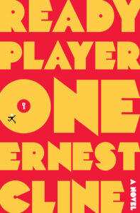 Book cover for Ready Player One (Ready Player One, #1) by Ernest Cline. The font of the title and author looks like it was made in the 1970s or early 1980s due to how it straddles the line between orange, red, and yellow. In the letter O, there is a tiny white key hidden. 