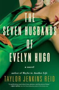 Book cover for The Seven Husbands of Evelyn Hugo by Taylor Jenkins Reid. Image on cover shows a white woman wearing a glamorous, silky green gown that shows off a little cleavage. 