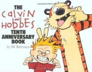 Book cover for The Calvin and Hobbes Tenth Anniversary Book by Bill Watterson. Image on cover shows Calvin and Hobbes making funny faces at the audience by pulling their cheeks gently away from their teeth and sticking out their tongues. 