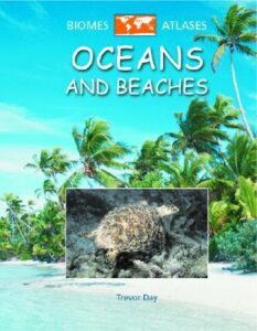 Book cover for Oceans and Beaches by Trevor Day . Image on cover shows a closeup photo of a turtle swimming in the ocean. Behind the photo is a drawing of palm trees waving in the breeze at the beach on a sunny day.