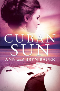 Book cover for Cuban Sun (Sofia Koury, #1) by Ann Bauer. Image on cover shows a Cuban woman’s face superimposed over what appears to be the hull of a modern ship. The sun is setting over the ocean in the distance. 