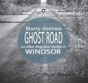 Book cover for Ghost Road And Other Forgotten Stories of Windsor by Marty Gervais. Image on cover is a black and white photo of a back country road that only has one vehicle driving on it. The grass and dry and looks dormant for the winter. 